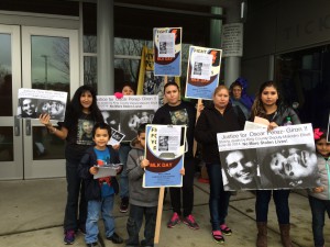 Family of Oscar Perez-Giron at MLK Day outside Garfield High School