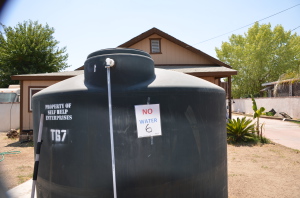 Water tank outside of a home in Porterville