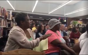 Community members speak out against Dean Esserman and the NHPD at a community meeting
