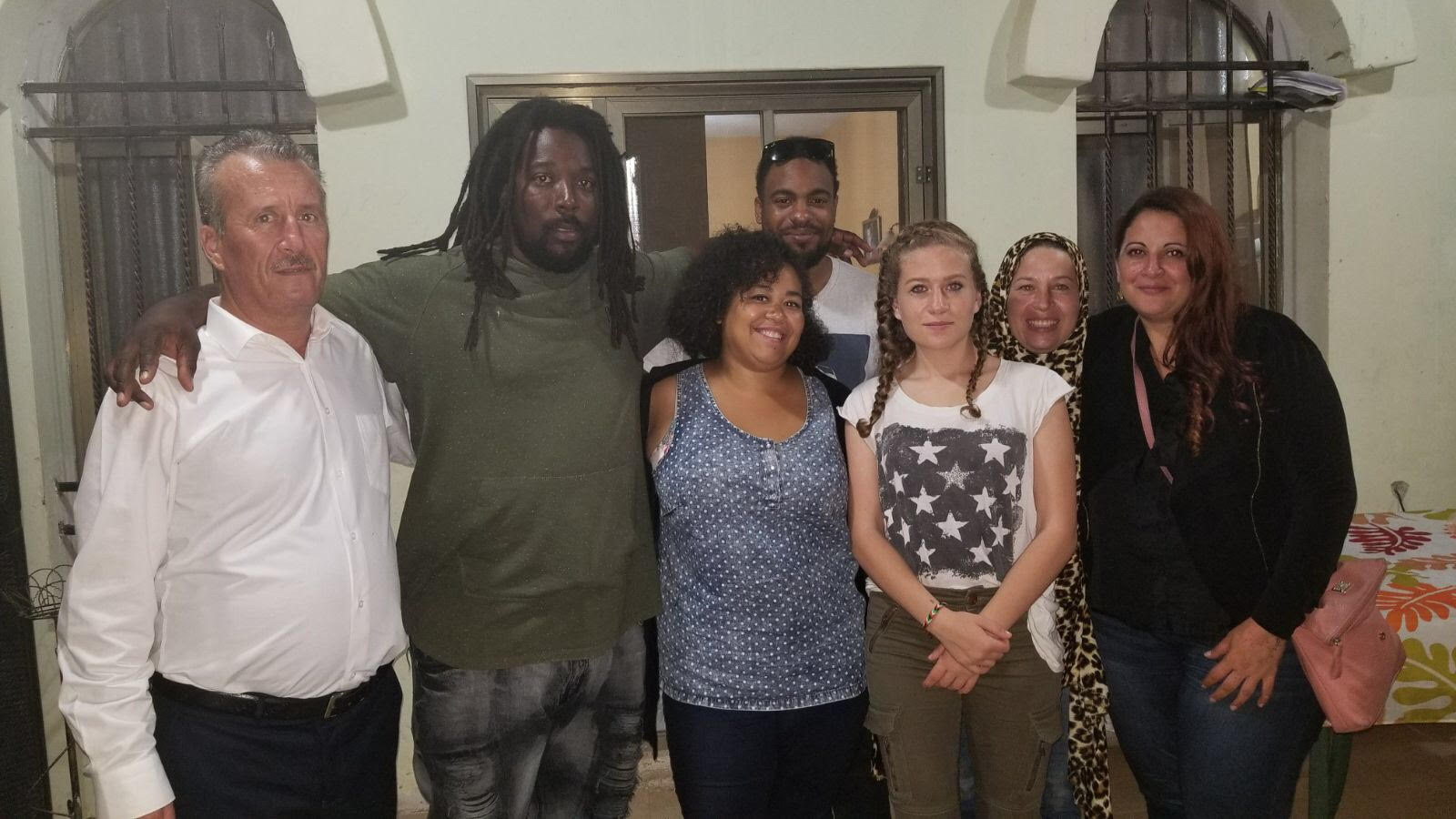 Photo: Author at center front center, next to Ahed. She is with the Tamimi family and other members of solidarity delegation.