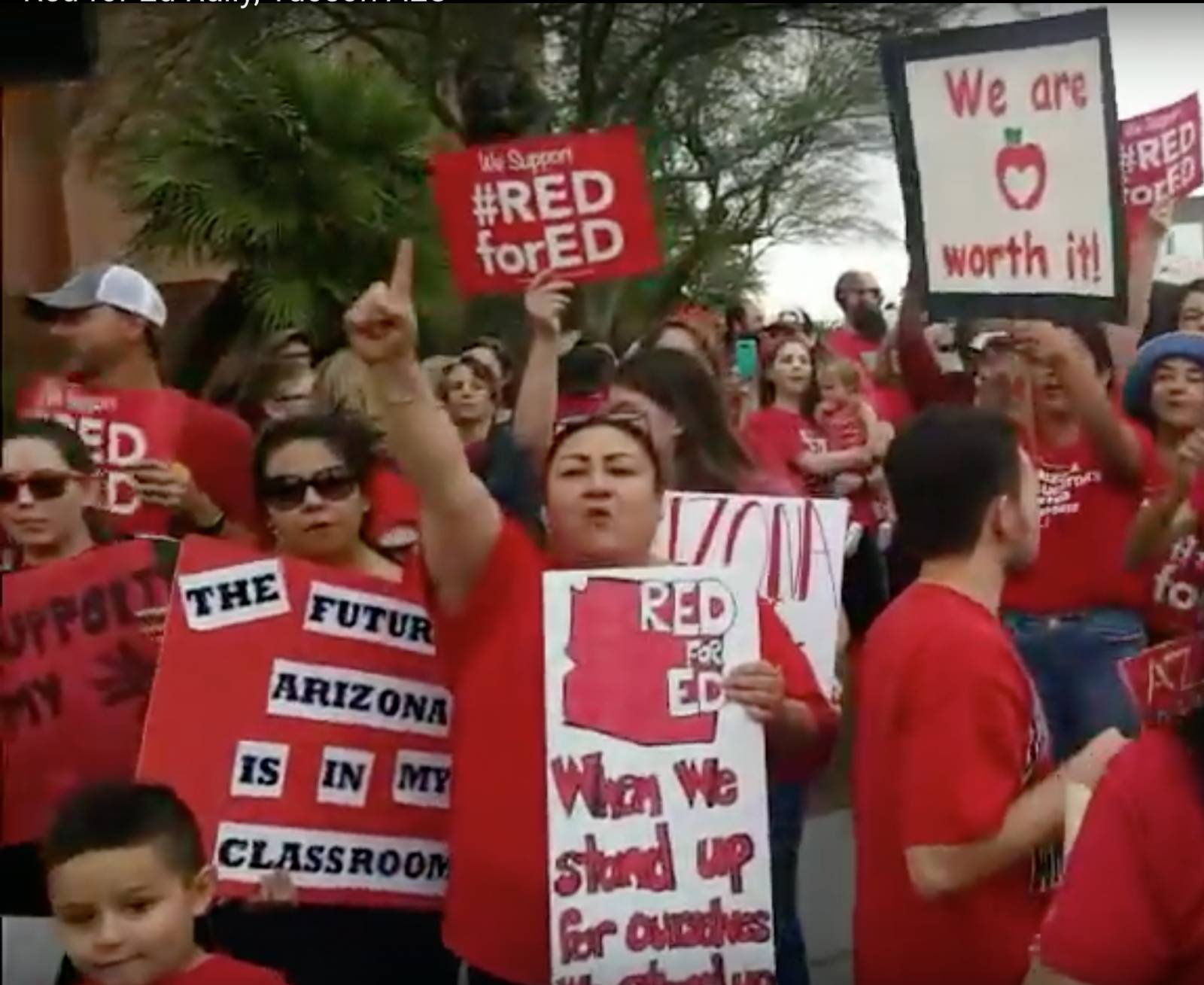 Red for Ed rally in Tucson. Liberation News screen shot of youtube video by Claire Corcoran.