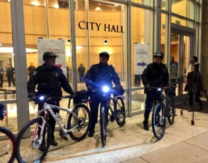 Heavy police presence at City Hall. Liberation photo. 