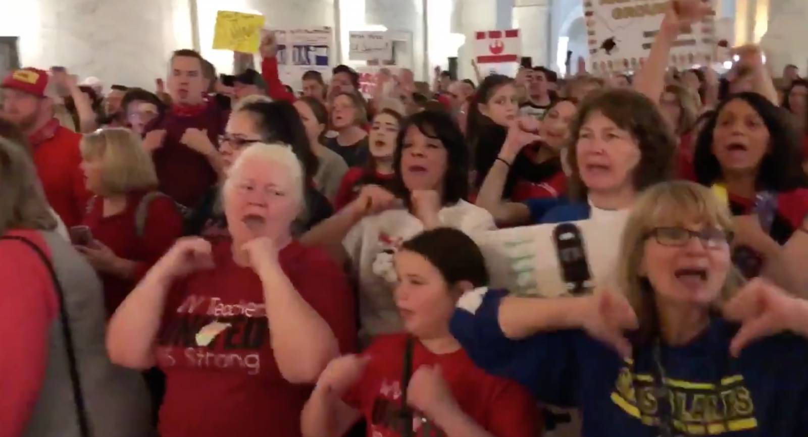 West Virginia teachers chant: "Who made history? We made history" at victorious conclusion of their 2018 statewide strike. Photo: Liberation screenshot by @ Carrie Hodousek
