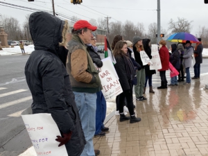 Activists rally outside of L3Harris in Northampton, Massachusetts.