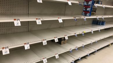Empty shelves in a Boston grocery store.
