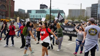 Sammie Lewis of Detroit Will Breathe leads demonstrators through downtown Detroit. Liberation photo: Brandon Stout