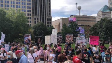 Abortion rights demonstrators and counter-protesters gather outside the Columbus, Ohio, State House. Liberation photo