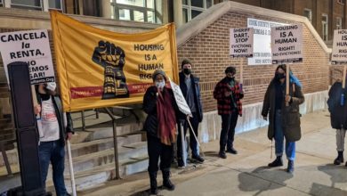 Organizers gather outside the Cook County Sheriff’s office on December 3 and demand an end to evictions. Liberation photo