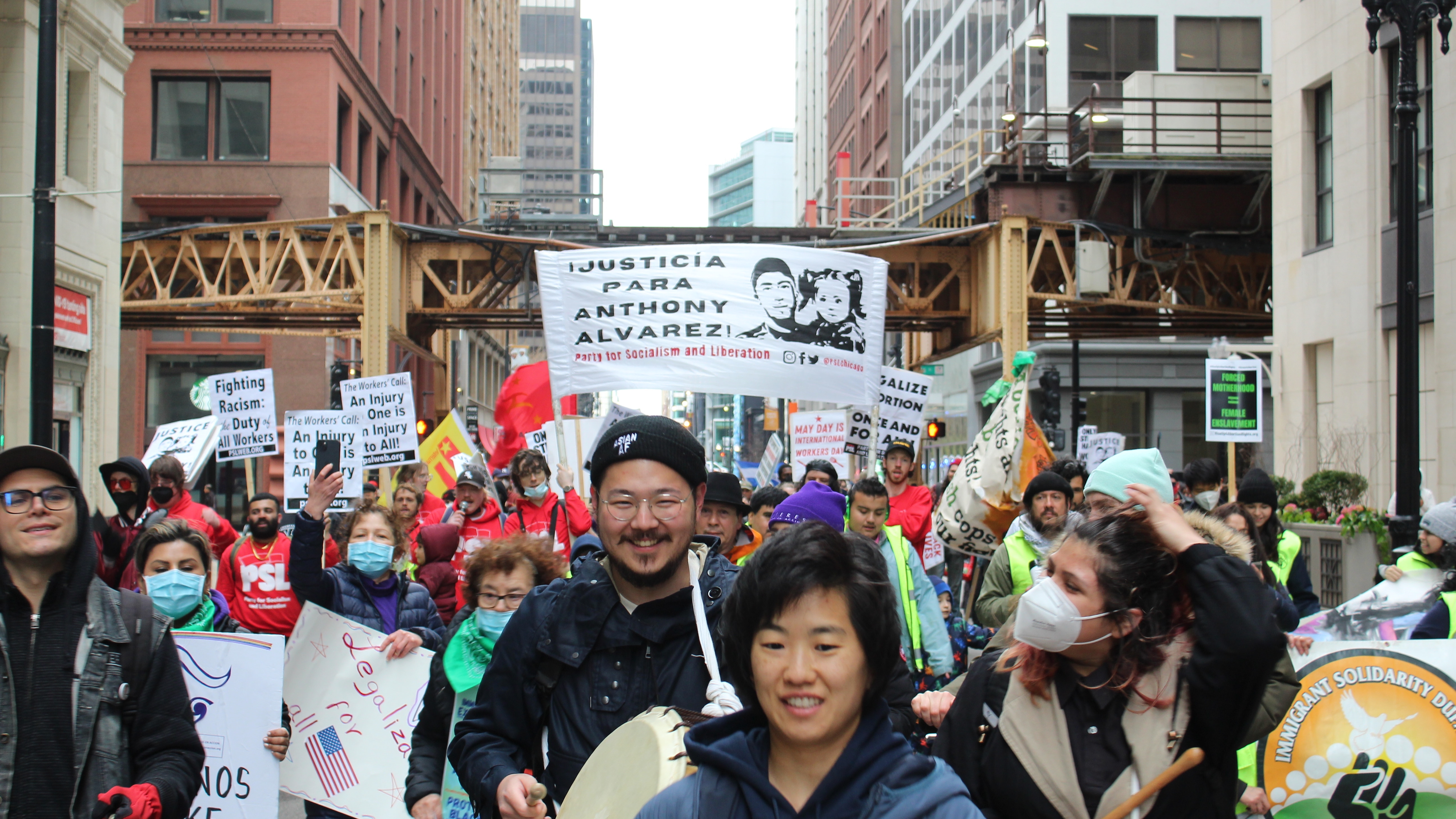 Demonstrators march through Downtown Chicago on May Day. Liberation photo