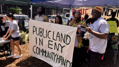 Community demands public ownership of NYPD lot. Liberation photo.