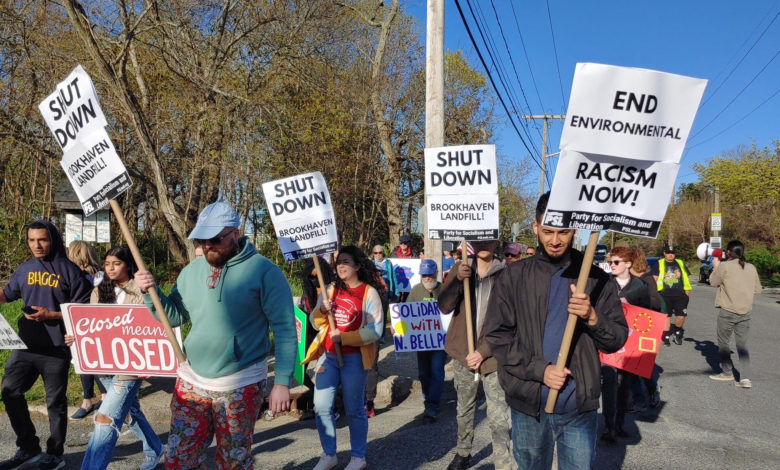 Community members march to close toxic landfill. Liberation photo: Danny Hopkins