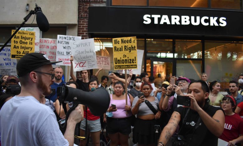 Fired Starbucks worker Austin Locke speaks to the crowd. Liberation photo.
